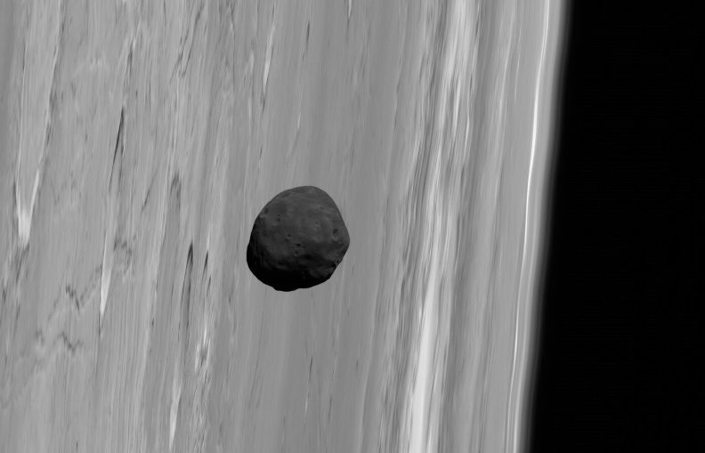 Phobos, the larger of Mars’ two tiny satellites, pictured near the limb of Mars by the robot spacecraft Mars Express in 2010. Credit: G. Neukum (FU Berlin) et al., Mars Express,