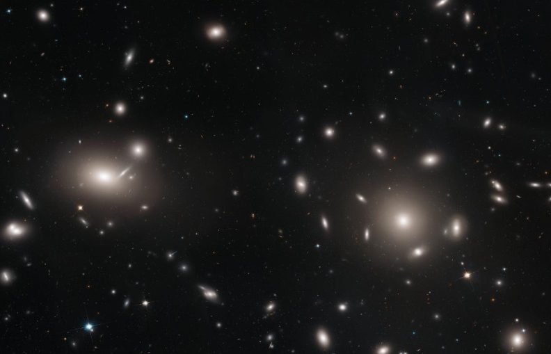 This is a Hubble Space Telescope mosaic of a portion of the immense Coma cluster of over 1,000 galaxies, located 300 million light-years from Earth.