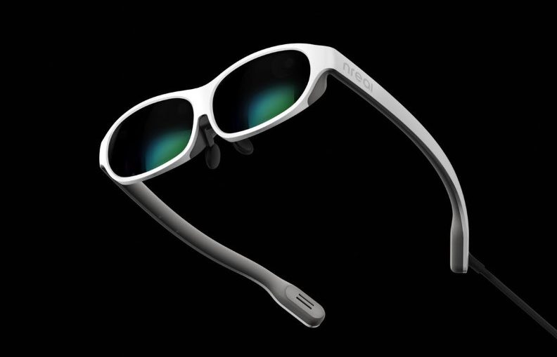 The nReal Light mixed reality glasses connect to a phone or laptop