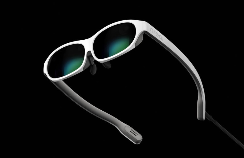The nReal Light mixed reality glasses connect to a phone or laptop