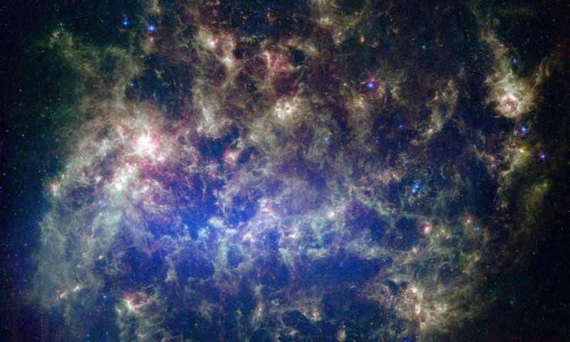 This vibrant image from NASA's Spitzer Space Telescope shows the Large Magellanic Cloud, a satellite galaxy to our own Milky Way galaxy.