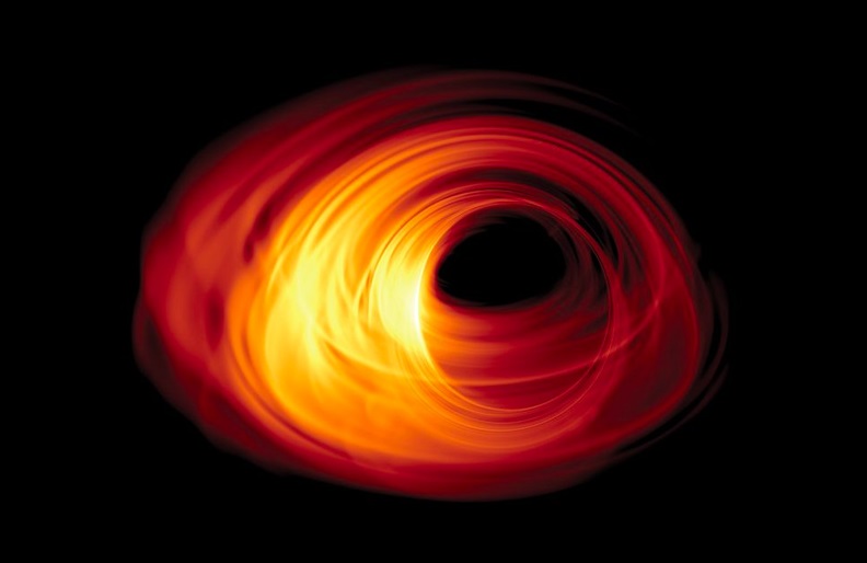 FIRST LOOK The first image from the Event Horizon Telescope may show that the black hole at the center of our galaxy looks something like this simulation.