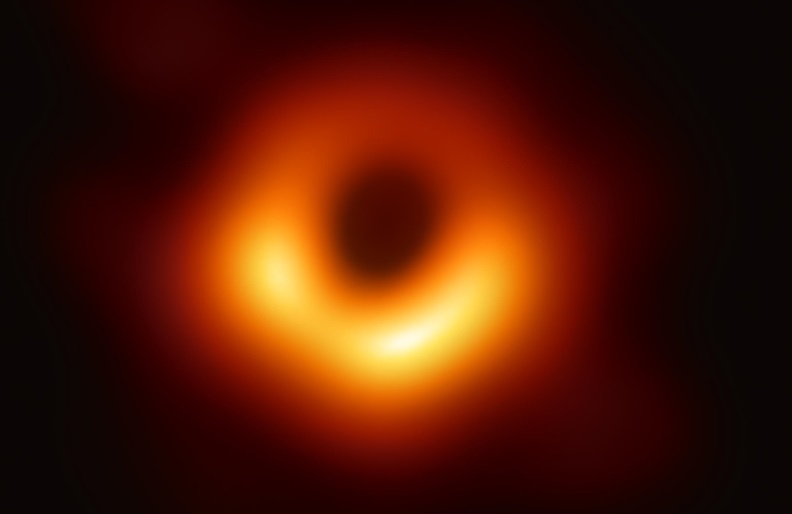The first-ever image of a black hole was released Wednesday by a consortium of researchers, showing the "black hole at the center of galaxy M87, outlined by emission from hot gas swirling around it under the influence of strong gravity near its event horizon."