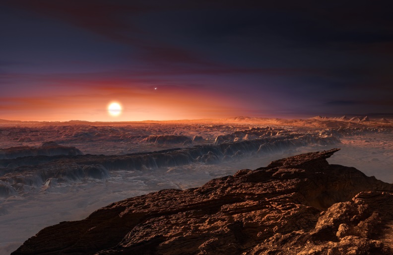 Artist's impression shows a view of the surface of the planet Proxima b orbiting the red dwarf star Proxima Centauri, the closest star to the Solar System.