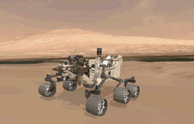 A 3D virtual model of Curiosity is shown inside Gale Crater on Mars.
