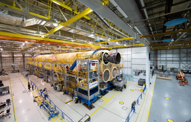 The Artemis I SLS core stage mated with the first of four refurbished Space Shuttle-era engines
